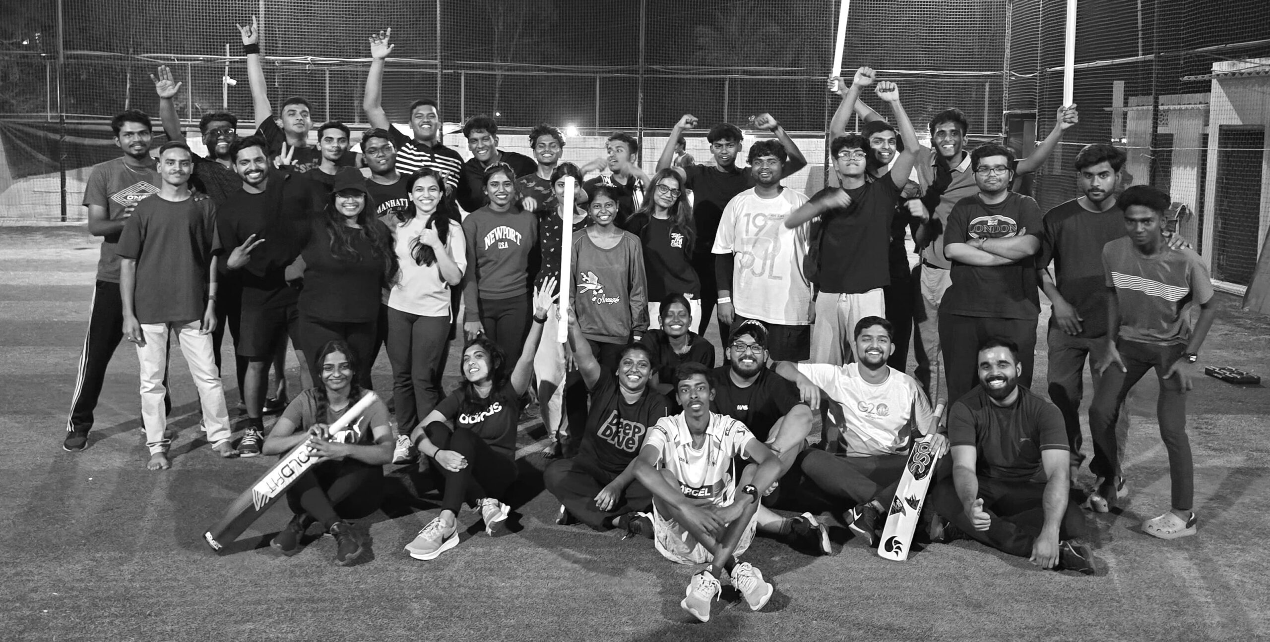 Young adults of City Harvest AG Church enjoying a game of Cricket at a turf.